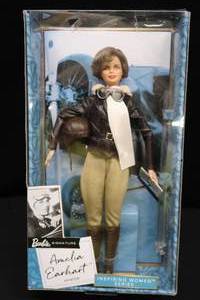 lot 34 image: SIGNED AMELIA EARHART AVIATOR BARBIE DOLL