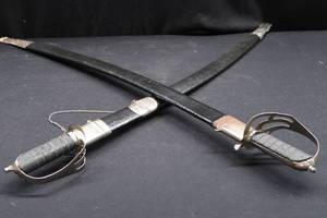 lot 69 image: PAIR OF SWORDS BOTH MADE IN INDIA , VERY ORNATE