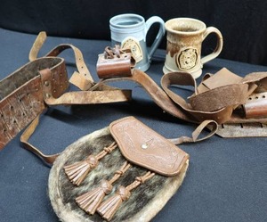 lot 123 image: RENISSANCE POTTERY MUGS AND LEATHER GOODIES