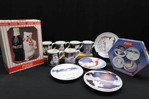 lot 83 image: COCA COLA COLLECTABLES MUGS, DESSERT PLATES AND COOKIE JAR