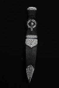 lot 144 image: MEDIEVAL SCOTTISH PIPER SGIAN