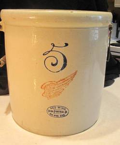 5 Gallon Red Wing Crock has a small...