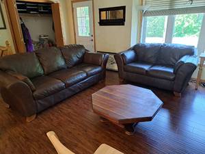lot 23 image: Leather Living Room Set - Couch and Love Seat