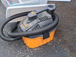 lot 108 image: Ridgid 4-Gallon Shop Vacuum