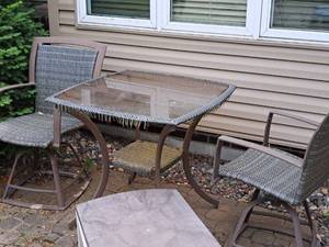 lot 11 image: Patio Set - Glass Top Table and (2) Swivel Chairs