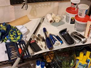 lot 298 image: Misc. Items - Xacto Knife Set, Jiffi Cutter, Flashlight, Plumbers Putty, String, Misc Hardware