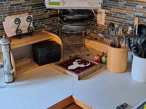 lot 399 image: Kitchenwares - Bread Box, Pans and Pan Rack, Salt & Pepper Shakers, Utensils in Wood and Glass Jars