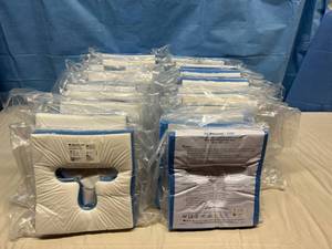 lot 75 image: MSRP $500  Lot Of 25 Packages NEW Mizuho OSI Pillow GentleTouch Headrest Pillows with Right Intubation Slot See Description & Pictures For Details