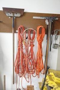 lot 212 image: Assorted Hardware -Extension Cords, Scraper, Squeegie