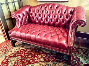 lot 6 image: Chesterfield Style Red Tufted Leather Settee