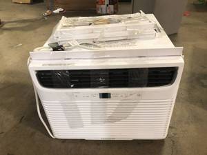 lot 23 image: Frigidaire 15,000 BTU 115-Volt Window-Mounted Median Air Conditioner with Temperature Sensing Remote Control Customer Returns See Pictures