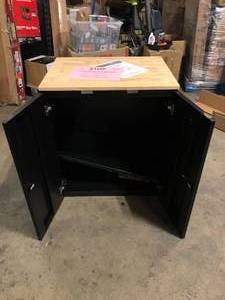 lot 35 image: Husky Heavy Duty Welded 20-Gauge Steel 2-Door Garage Base Cabinet in Black (28 in. W x 32 in. H x 21.5 in. D)    Customer Returns See Pictures