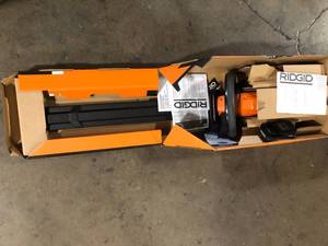 lot 41 image: RIDGID 18V Brushless Cordless Battery 22 in. Hedge Trimmer  Customer Returns See Pictures