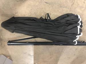lot 19 image: Outdoor Umbrella Missing Pieces Customer Returns See Pictures