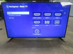 lot 816 image: Westinghouse 50 4K Ultra HD Smart Roku TV with HDR WR50UT4212