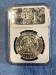 lot 8 image: 1885-O  Morgan Silver Dollar NGC MS64
