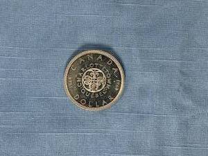 lot 38 image: 1964 Canadian Silver Dollar