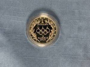 lot 44 image: 1988-S Olympic Proof Commemorative Silver Dollar