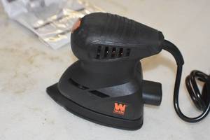 lot 31 image: Palm Sander