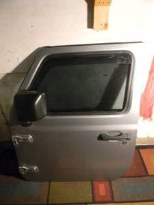lot 5 image: 2021 JEEP WRANGLER UNLIMITED FRONT DRIVER DOOR WITH MIRROR, WINDOW GLASS, ELECTRIC WINDOW, INTERIOR DOOR PANEL - VERY NICE CONDITION - NO RESERVE - SEE PICTURES
