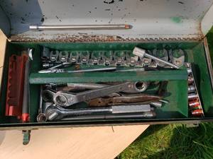 Metal Toolbox and Wrenches Pictured