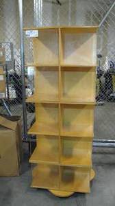 lot 28 image: 4 Sided Rotating Shelf Display on Wheels