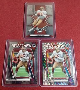 lot 31 image: (3) Mosaic Joe Montana Cards
