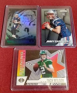 lot 54 image: (3) QB Rookie Cards - Mac Jones, Garoppolo, Wilson