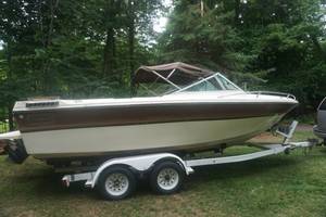 lot 1 image: 1983 Webbcraft 20 Open Bow Boat With EZ Load Tandem Axle Trailer