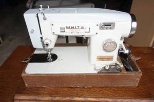 lot 12 image: AntiqueVintage...White Sewing Machine in Case