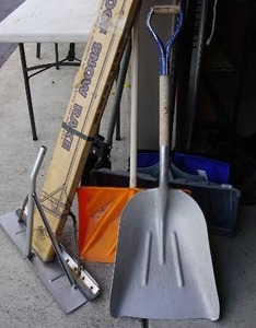 lot 95 image: Garage...Post Hole Digger, Ice PickScraper, Snow Shovels, Roof Snow Shovel, Scoop Shovel Etc.