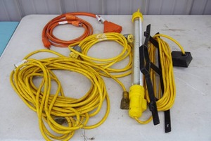lot 99 image: Garage...Extension Cords and Work Light