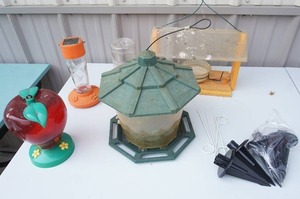 lot 134 image: Lawn & Garden Decor...Bird Feeders and Hardware