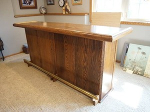 lot 330 image: Vintage HomeFurnitureBar...Beautiful Solid Oak One Piece Bar with Foot Rail and Back Side Storage