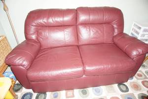 lot 398 image: FurnitureLivingDen...Lane Leather Loveseat Cranberry, Brown Cushioned Stool Included