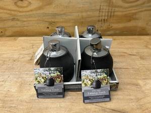 lot 63 image: BETTER HOMES & GARDENS Lot of 4- Tabletop Torches