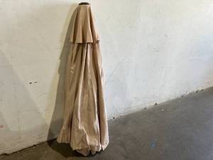 lot 306 image: Abba 9 ft. Beige Outdoor Patio Market Umbrella with Auto Tilt and Crank