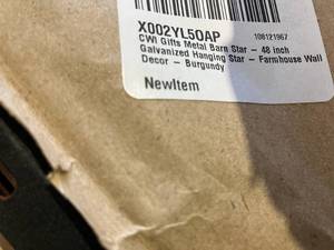 lot 318 image: CWI Gifts 48 inch Burgundy Galvaized Metal Hanging Barn Star