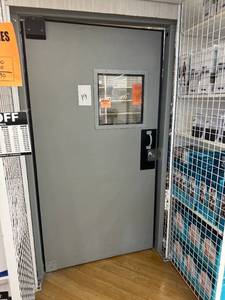lot 19 image: Grey locking swing door with window