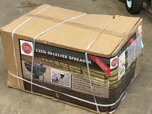 lot 5 image: Unused D.R. 125# Receiver-Mount Broadcast Spreader