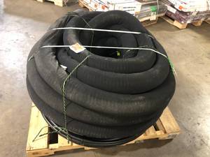 lot 27 image: Advanced Drainage Systems 4 in. x 100 ft. Singlewall Perforated Drain Pipe with Filter Sock   Customer Returns See Pictures