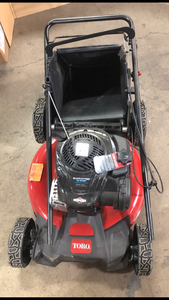 lot 22 image: Toro 21 in. Recycler Briggs and Stratton 140cc Self-Propelled Gas RWD Walk Behind Lawn Mower with Bagger Customer Returns See Pictures