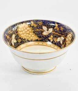 lot 142 image: Grapevine Bowl in Blue and Gold