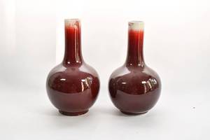 lot 10 image: Pair of Glazed Red Vases