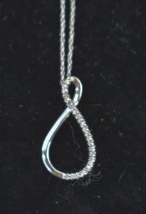 lot 204 image: 10K White Gold Diamond Pendant