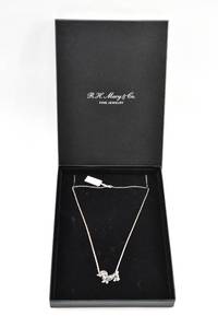 lot 188 image: Sterling Silver and Gold Vermeil Dachshund Necklace by R.H. Macy and Co.