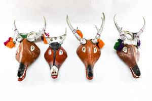 lot 30 image: Four Handmade Folk Art Deer Masks