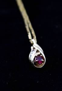 lot 193 image: Ruby and Diamond Pendant on a 14K Italian Gold Chain