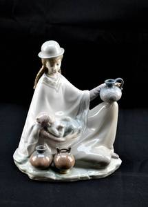 lot 111 image: Porcelain Peruvian Girl with a Baby Sculpture by Lladro