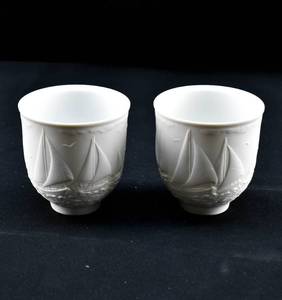 lot 112 image: Pair of Portavela Regata Porcelain Candle Holders by Lladro